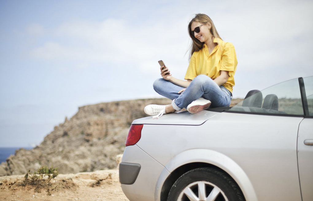 sitting on car